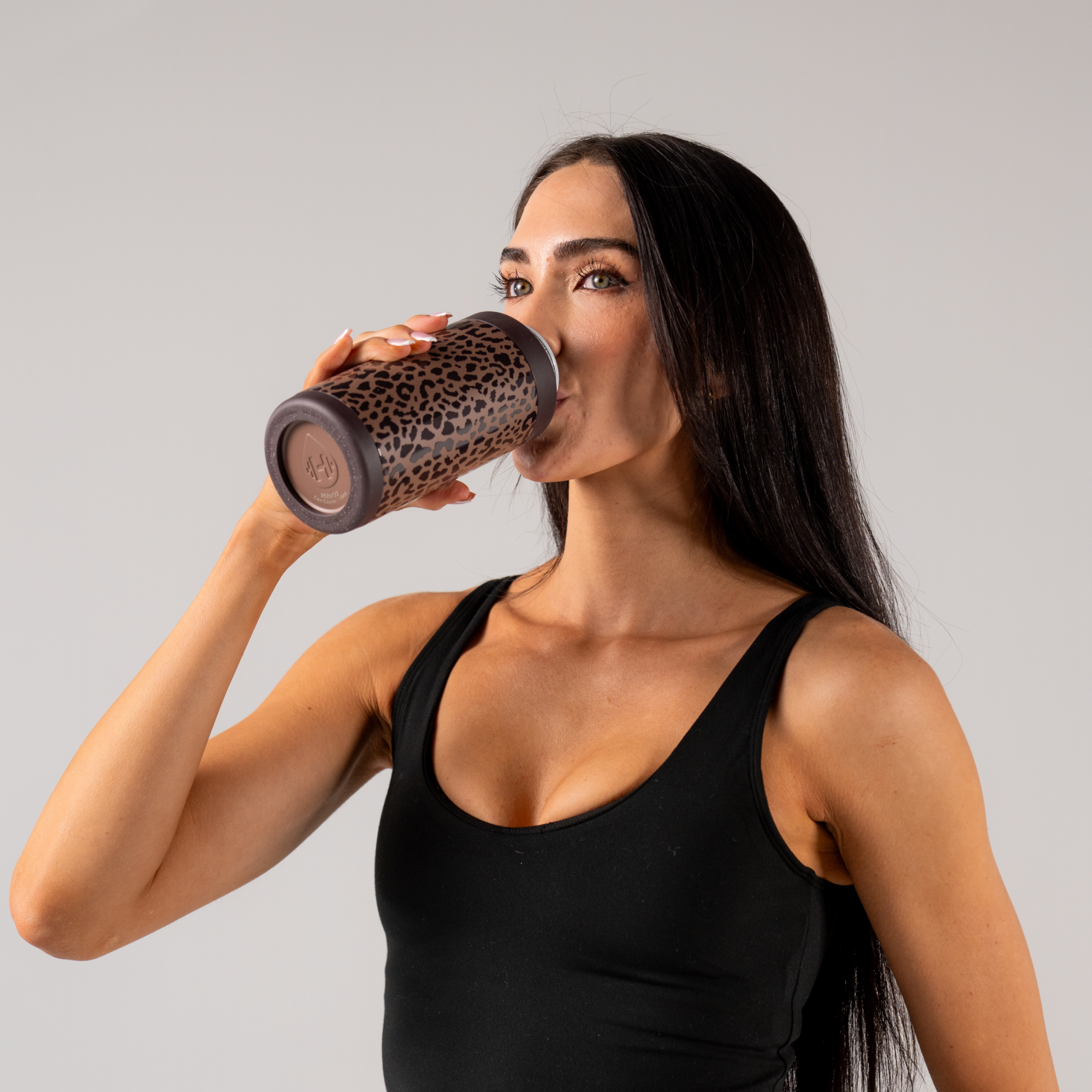 Woman Drinking from HydroJug Brown Leopard Can Cooler 16oz