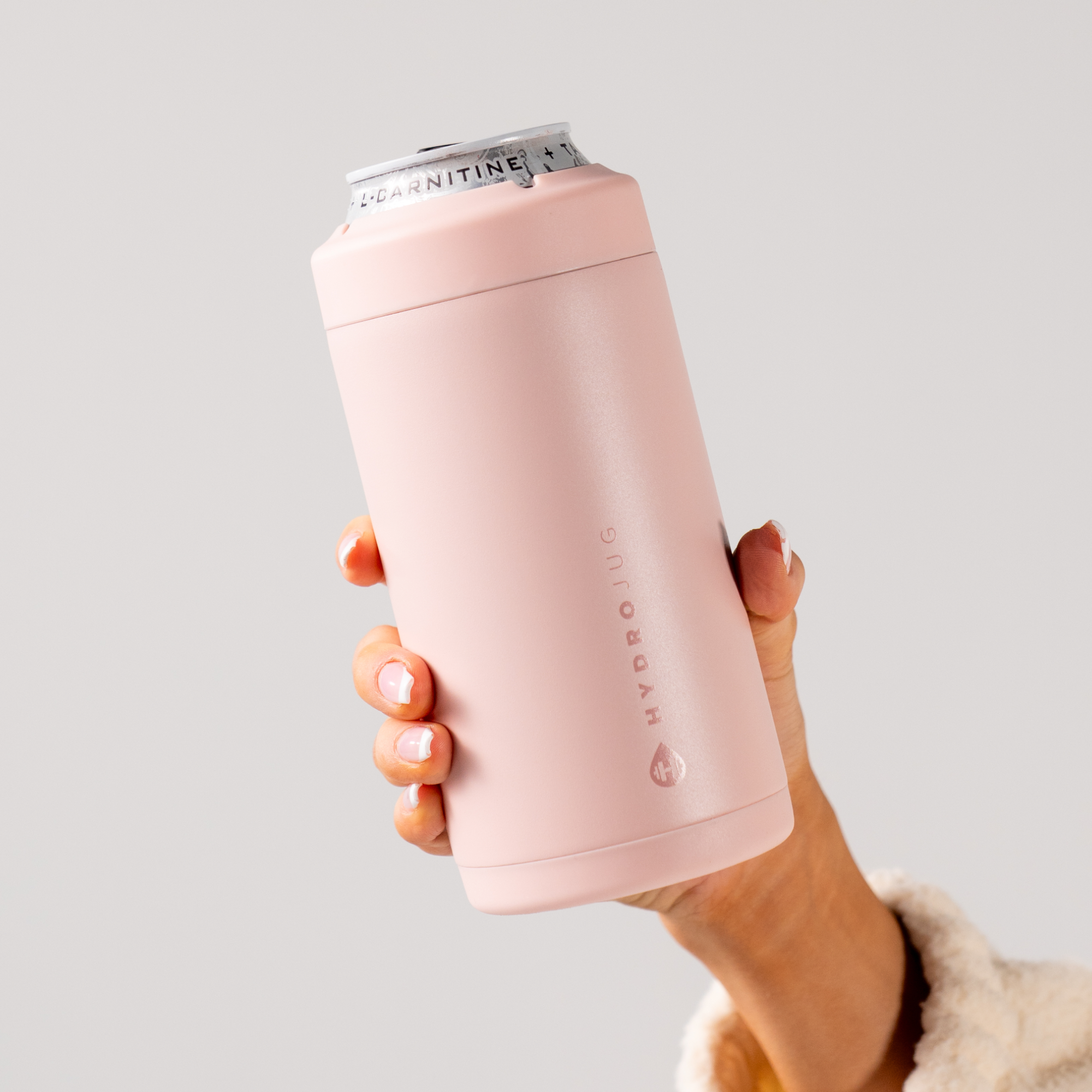 Hands Holding a HydroJug Dusty Rose Can Cooler 16oz