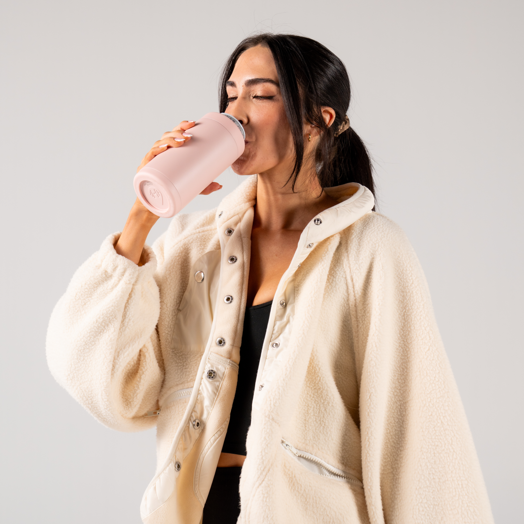 Woman Drinking from Dusty Rose Can Cooler 16oz