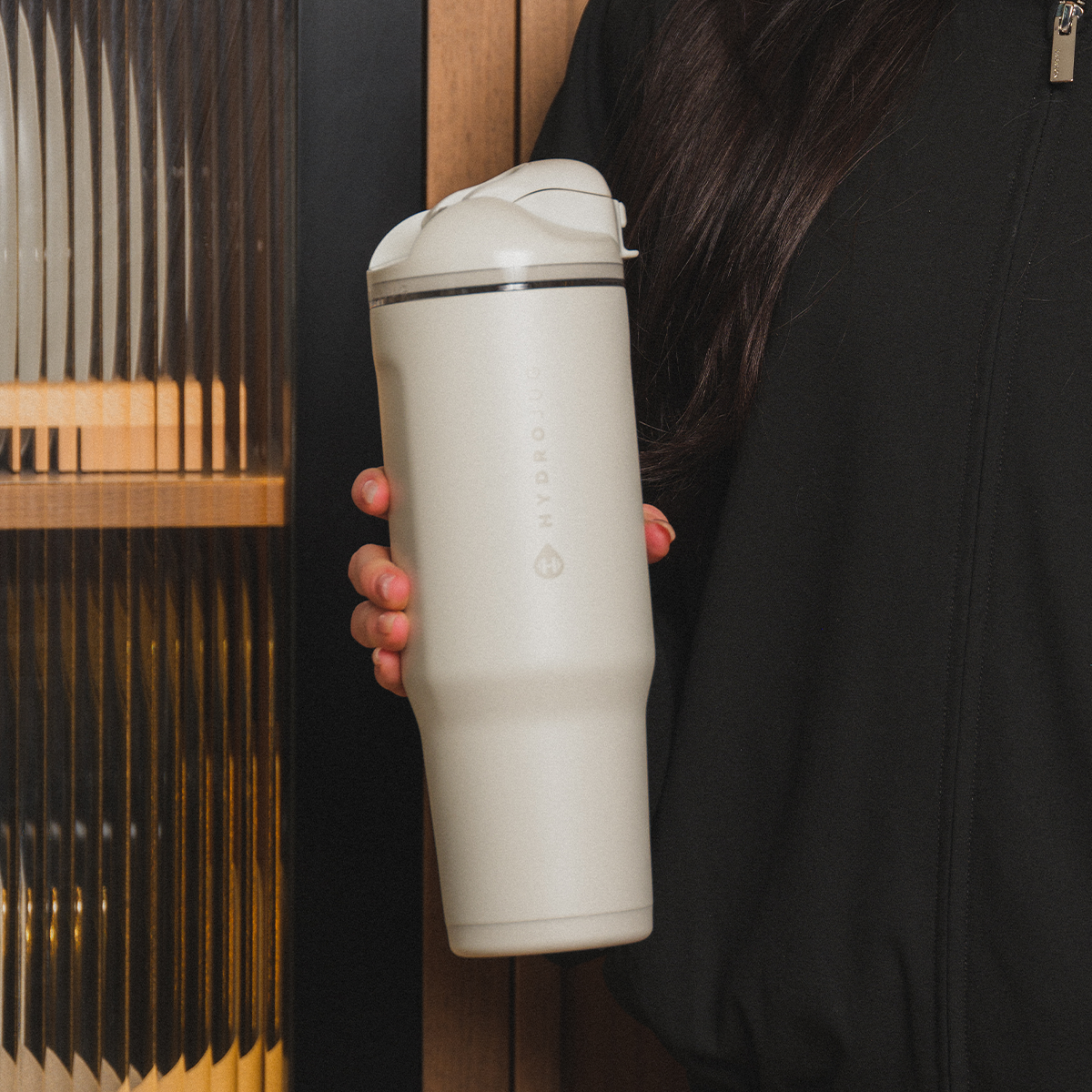 Person Holding 40oz Linen HydroJug Ease2o