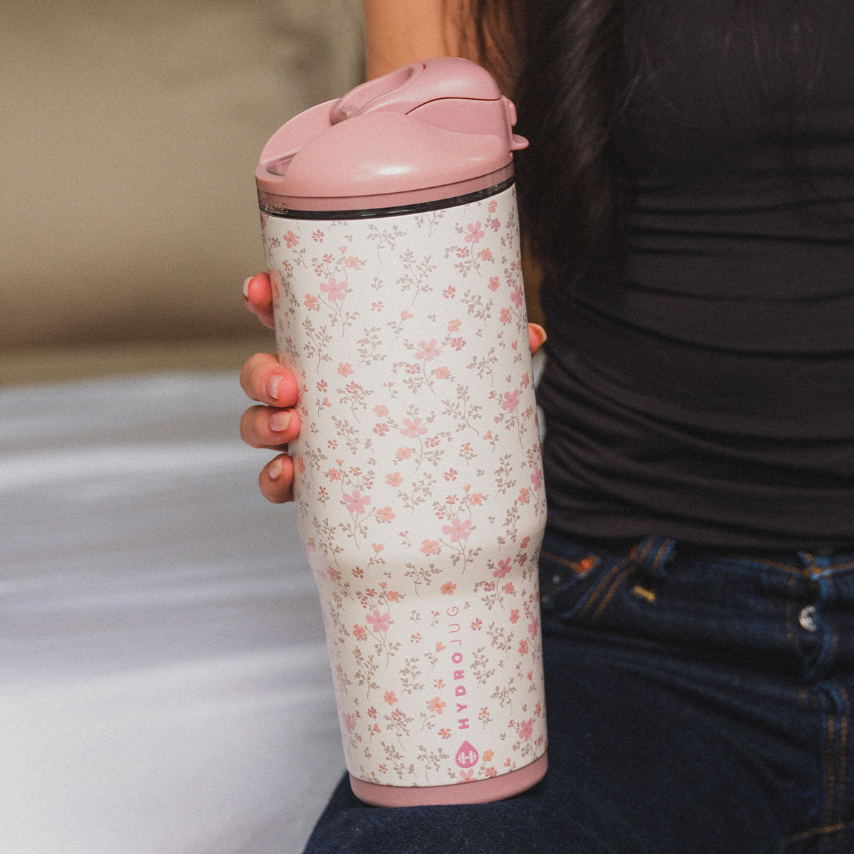 Person Holding 40oz Magnolia HydroJug Ease2o