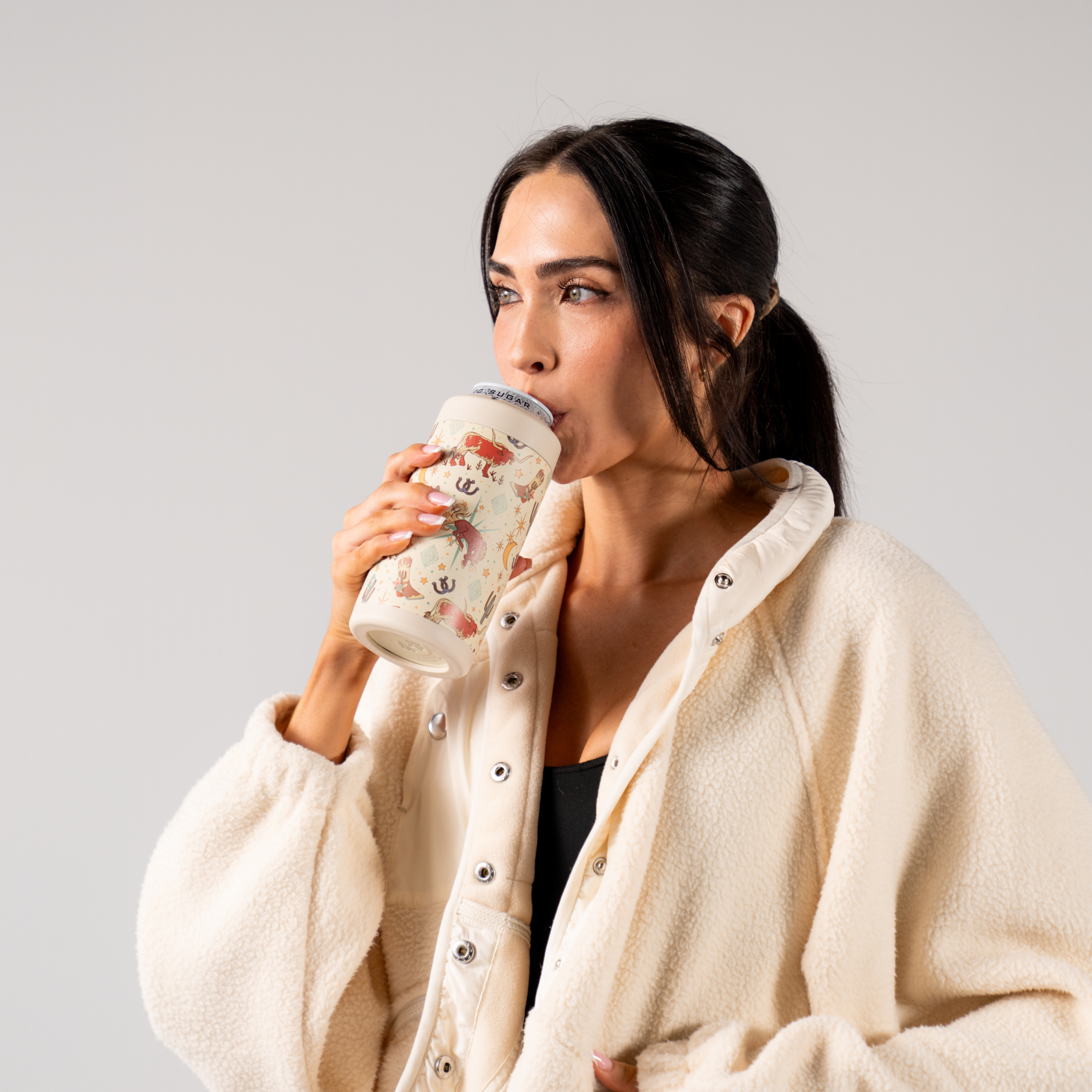 Woman Drinking from Rodeo Can Cooler 16oz