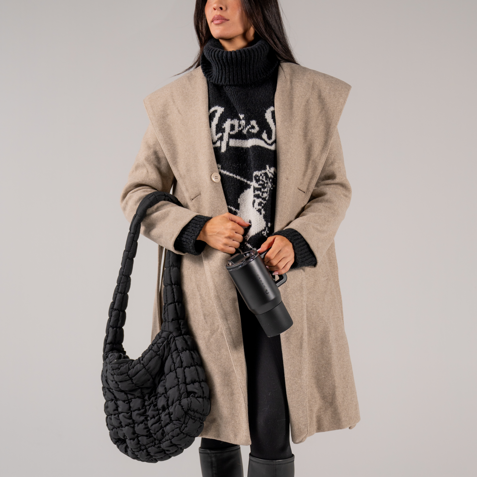 Woman Holding Black Coffee Traveler 